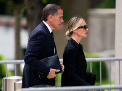 Hunter Biden with his wife, Melissa Cohen Biden, arrive at court (Matt Rourke/AP)