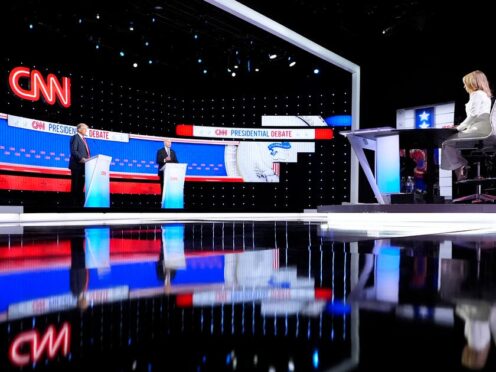 US President Joe Biden, stage right, and Republican presidential candidate former president Donald Trump, stage left, take part in a presidential debate (Gerald Herbert/AP)