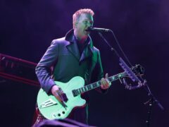 Josh Homme of Queens Of The Stone Age is returning to the US for surgery (Yui Mok/PA)
