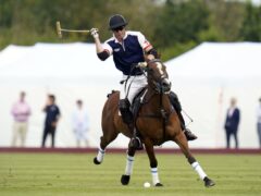 The Prince of Wales in action during the Out-Sourcing Inc Royal Charity Polo Cup 2023 at Guards Polo Club, Windsor in 2023 (Andrew Matthews/PA)
