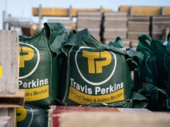 Building supplies firm Travis Perkins has hired former Taylor Wimpey boss Pete Redfern as its new chief executive as it looks to turnaround the group’s fortunes (Travis Perkins/PA)
