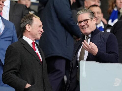 Sir Keir Starmer and Arsenal executive vice-chairman Tim Lewis (left) in the stands at Amex Stadium, Brighton (Gareth Fuller/PA)