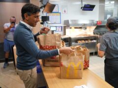 Prime Minister Rishi Sunak bought breakfast for those on the Tory battle bus at Beaconsfield Services in Buckinghamshire ( Jonathan Brady/PA)