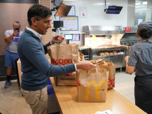 Prime Minister Rishi Sunak bought breakfast for those on the Tory battle bus at Beaconsfield Services in Buckinghamshire ( Jonathan Brady/PA)