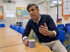 Prime Minister Rishi Sunak talks to a reporter during a visit to Braishfield Primary School in Romsey, Hampshire, while on the General Election campaign trail (Jonathan Brady/PA)