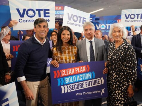 (left-right) Prime Minister Rishi Sunak, his wife Akshata Murty and his parents Usha and Yashvir Sunak at Romsey Rugby Club in Hampshire (Jonathan Brady/PA)