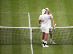 Jannik Sinner with Matteo Berrettini after an entertaining second-round tie at Wimbledon (Aaron Chown/PA)