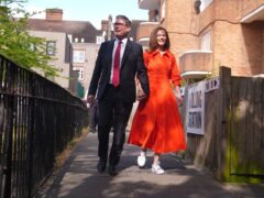 Labour leader Sir Keir Starmer and his wife Victoria arrive to cast their votes in the 2024 General Election (James Manning/PA)