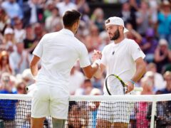 Jacob Fearnley, right, following his defeat to Novak Djokovic in the second round of Wimbledon (Mike Egerton/PA)