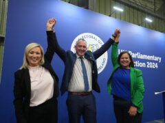 Sinn Fein MP for Mid Ulster Cathal Mallaghan celebrates his election with Michelle O’Neill and Mary Lou McDonald at Meadowbank Sports Arena, Magherafelt (PA)