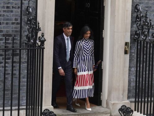 Outgoing prime minister Rishi Sunak joined by wife Akshata Murty as they prepared to leave Downing Street (Gareth Fuller/PA)