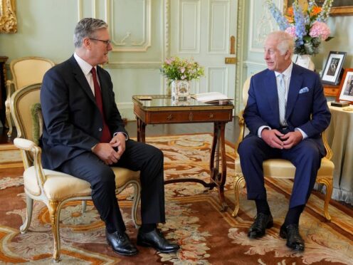 King Charles III speaks with Sir Keir Starmer during an audience at Buckingham Palace, London, where he invited the leader of the Labour Party to become Prime Minister and form a new government (Yui Mok/PA)
