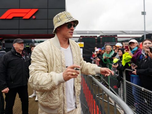 Brad Pitt arrives ahead of practice 3 of the British Grand Prix at Silverstone (David Davies/PA)