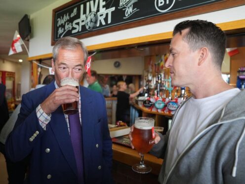Reform UK leader Nigel Farage (left) and new Reform MP for South Basildon and East Thurrock, James McMurdock (right), during a visit to Wyldecrest Sports Country Club, Corringham, Essex (Joe Giddens/PA)
