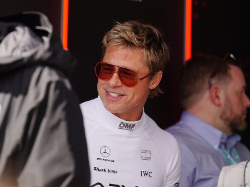 Brad Pitts looks on during qualifying for the British Grand Prix at Silverstone (David Davies/PA)