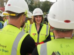 Chancellor Rachel Reeves speaking to apprentices during a visit with Deputy Prime Minister Angela Rayner to the Oval Village project in London (Lucy North/PA)