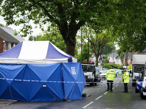 West Midlands Police at the scene (Jacob King/PA)