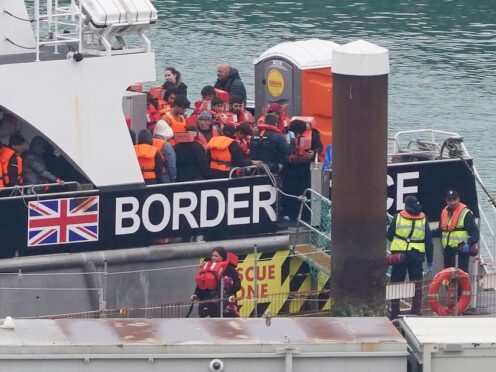 A group of people thought to be migrants are brought in to Dover (Gareth Fuller/PA)