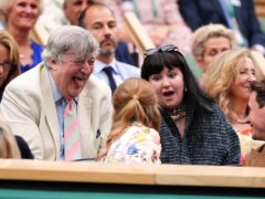 Stephen Fry and Lena Dunham in the royal box at Wimbledon (Zac Goodwin/PA)