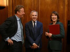 Chancellor of the Exchequer Rachel Reeves with Former governor of the Bank of England Mark Carney (centre)at the announcement of the establishment of the National Wealth Fund (Justin Tallis/PA)