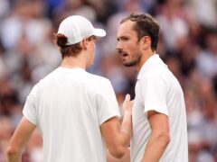 Daniil Medvedev and Jannik Sinner, left, after a Centre Court battle at Wimbledon (Zac Goodwin/PA)