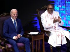 US President Joe Biden sits with Bishop Ernest C Morris Sr at a church service at Mount Airy Church of God in Christ in Philadelphia (Manuel Balce Ceneta/AP)