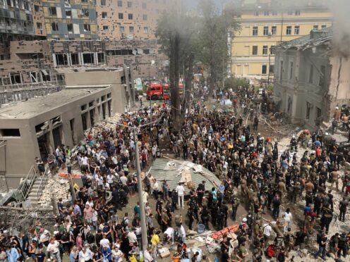 Rescuers search for victims after a Russian missile hit the country’s main children hospital Okhmadit in Kyiv, Ukraine (AP Photo/Anton Shtuka)