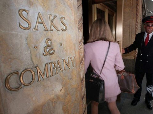 The parent company of Saks Fifth Avenue has signed a deal to buy upscale rival Neiman Marcus for more than £2 billion (Richard Drew/AP)
