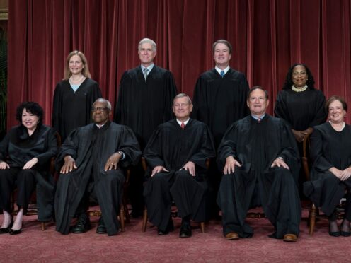 Members of the Supreme Court sit for a group portrait in Washington (J Scott Applewhite/AP)