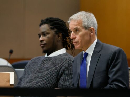 Young Thug, real name Jeffery Williams, and his lawyer, Brian Steel, watch Judge Ural Glanville speak during the hearing of key witness Kenneth Copeland at the Fulton County Superior Court in Atlanta on June 10, 2024 (Miguel Martinez/Atlanta Journal-Constitution via AP, file)
