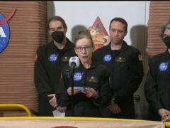 Kelly Haston, a crew member of the first CHAPEA mission, speaks in front of other members, from left to right, Ross Brockwell, Nathan Jones and Anca Selariu (Nasa via AP)