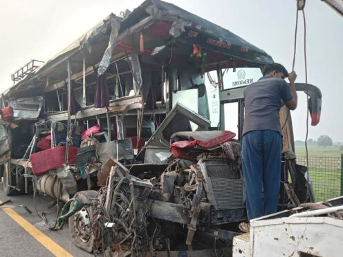 At least 18 people were killed and many others injured when a double-decker bus collided with a milk truck in northern India (AP)