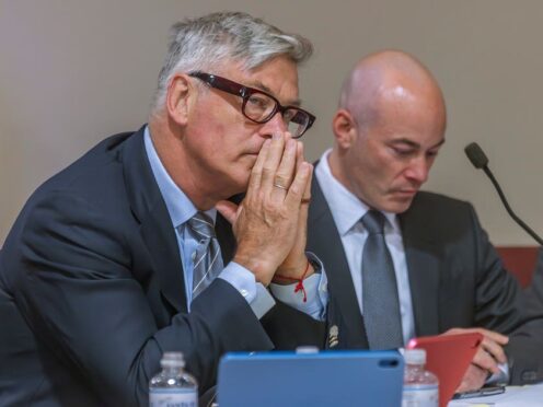 Actor Alec Baldwi, sits with his lawyer Luke Nikas in court in Santa Fe (Luis Sanchez Saturno/Santa Fe New Mexican via AP)