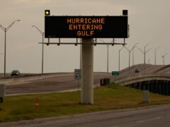 A sign notifies motorists to prepare for Beryl in Portland, Texas, on Sunday (Eric Gay/AP)