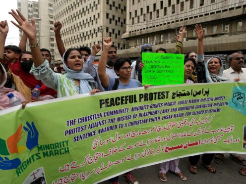 Members from Pakistan’s minority community and civil society chant slogans during a demonstration against the conviction of a Christian man on charges of blasphemy and to condemn the country’s blasphemy laws (Fareed Khan/AP)