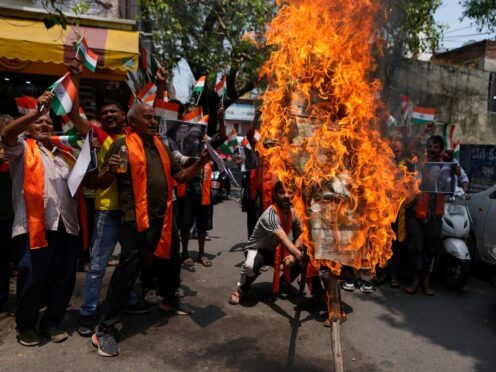 Activists of right-wing Hindu groups protest at Monday’s killing of five soldiers in Indian-controlled Kashmir (Channi Anand/AP)