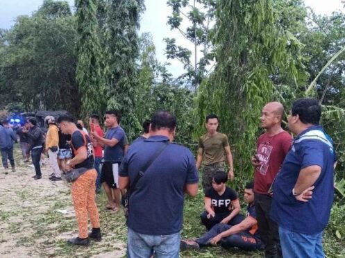 Police and rescuers prepare to evacuate injured people (Regional Police Information Office 9 via AP)