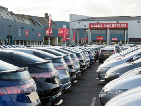 Spending on car purchases has risen three times faster than for public transport journeys, new figures show (Alamy/PA)