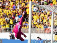 Colombia’s goalkeeper David Ospina fails to stop a free kick from Brazil’s Raphinha (Tony Avelar/AP)