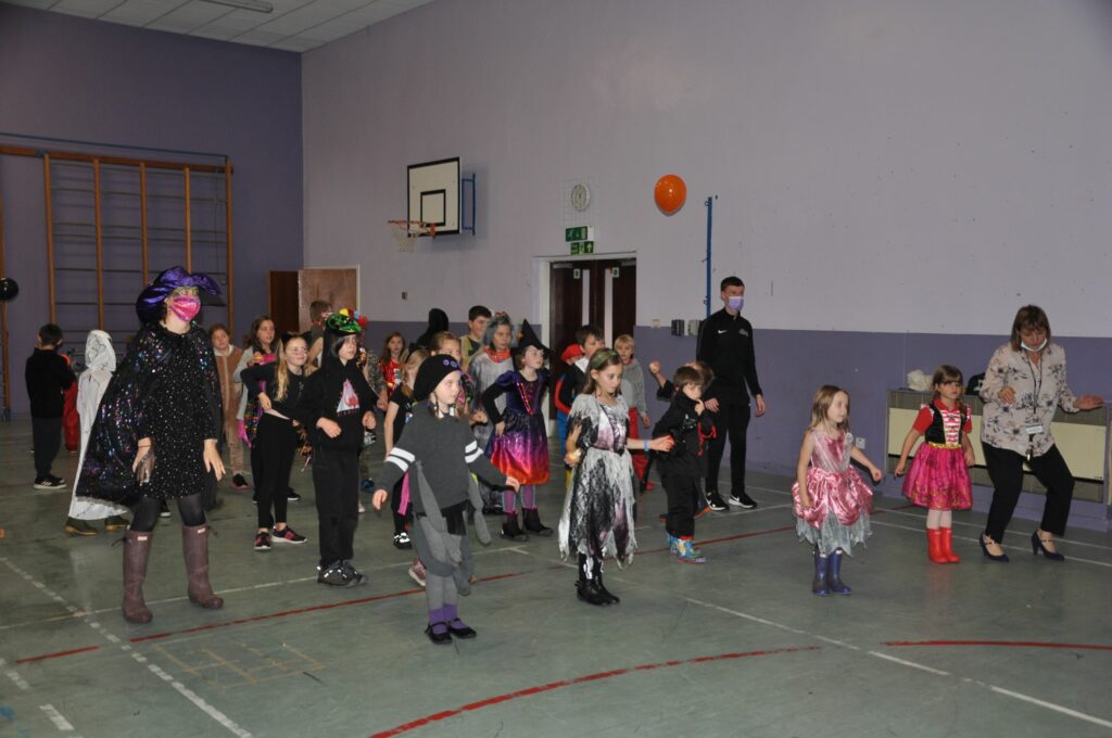 Lamlash Primary teachers join pupils in a number of action dances.