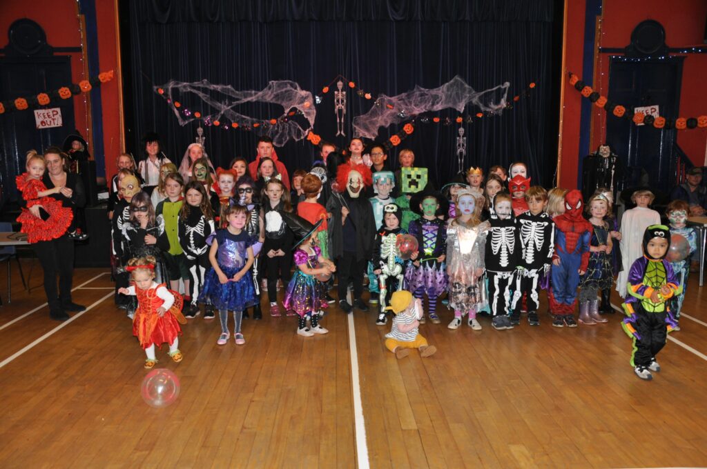 Whiting Bay children pose for a group photograph at their Hallowe’en party.