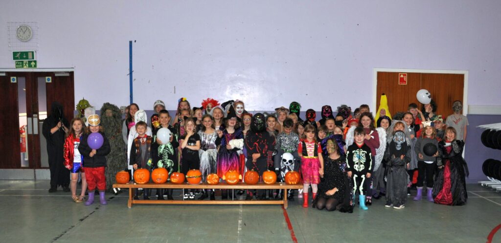 Lamlash Primary pupils pose for a group photograph at their Hallowe’en party.