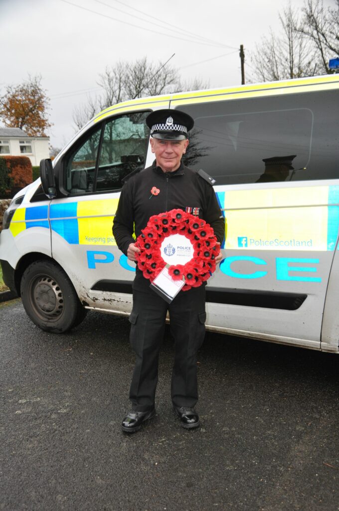 Special Constable Andrew Perrie laid a wreath at the cenotaph as his last official duty before retiring from Police Scotland.