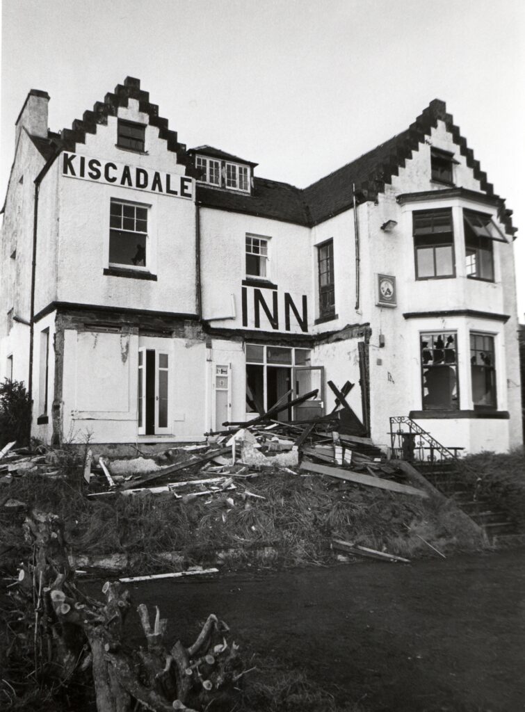 A familiar site since before the war, the Kiscadale Hotel in Whiting Bay, during demolition. A small number of houses will be built on the site.
