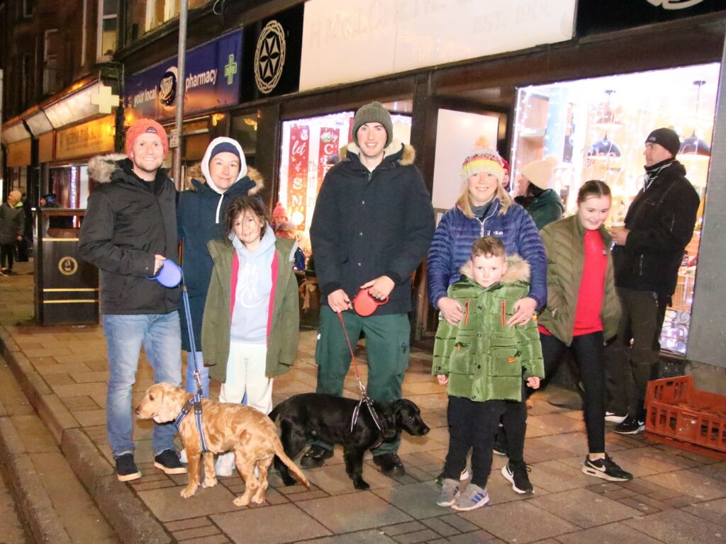 Families turned out for the festive lights switch-on despite the stormy weather.