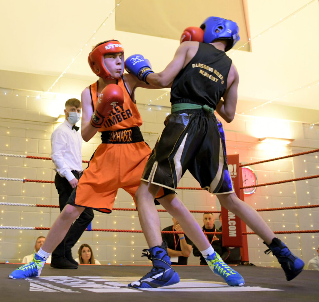 First Lochaber boxer in the ring at the home show and making his debut Toby Jackson scores in his bout against Glasgow Boxing Academy’s Adam Irfan. Photograph:  Abrightside Photography.

NO F46 Boxing show 04