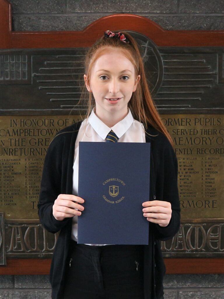 Emily Bennie, winner of Excellent Achievement Awards for Music and Biology.