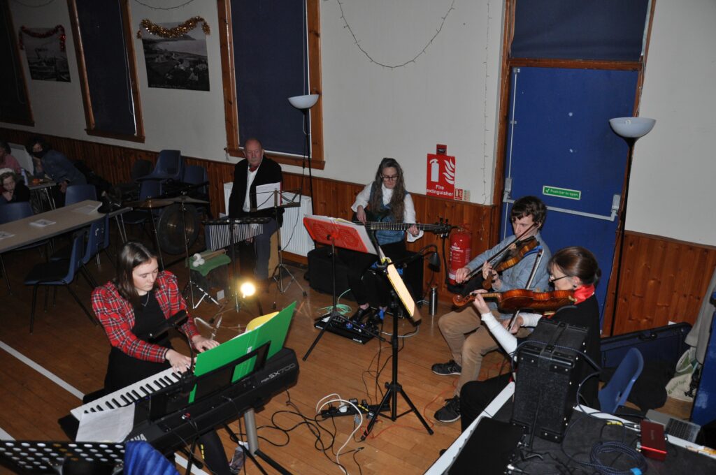 The Arran Ceilidh Band provided the music before, during, and after the performance.