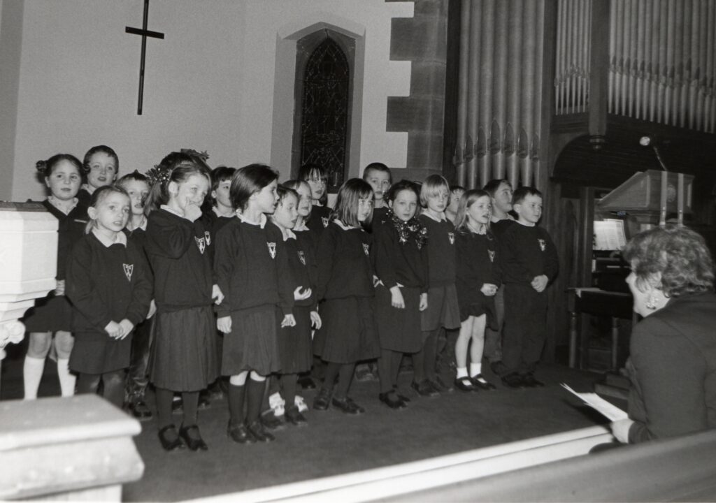 Brodick Primary children sing carols at Brodick Church before the school term finishes.