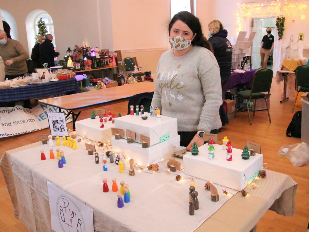 Jessica Bunting sold hand-painted wooden peg dolls from her Pegs 4 Tots stand.